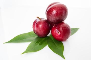 fresh plum isolated on white background