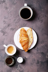 Fresh coffee with croissant