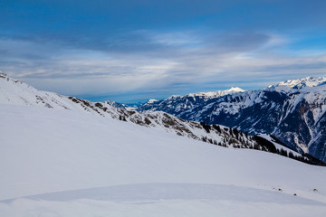 Fototapeta na wymiar beautiful mountains and sky in winter