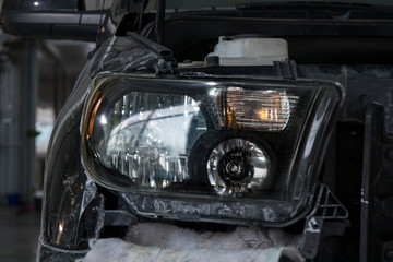 Car headlight after repair and cleaning.