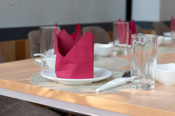 decorate serving table setting for party with red napkin