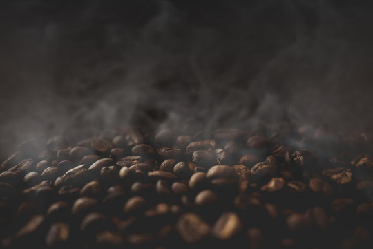 Close up of coffee beans with smoke