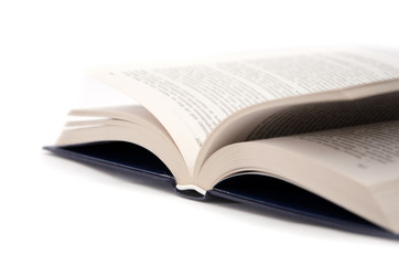 open book on a white background. Part of the book, close-up.