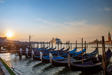 Gondolas of Venice Italy in the morning against the backdrop of sunrise