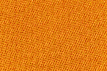 Background made of a closeup of an orange fabric texture