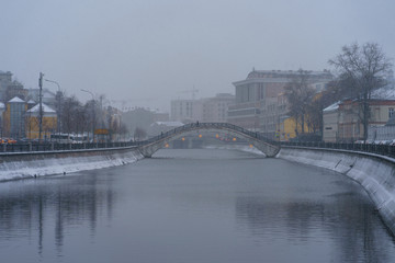 Winter city downtown. Photography of Sadovnichesky Bridge and Vodootvodny Canal in Moscow. The beauty of capital concepts.