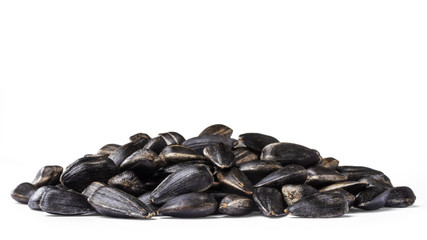 A bunch of sunflower seeds isolated on the white background.