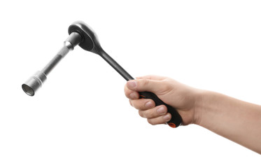 Auto mechanic holding socket wrench isolated on white, closeup