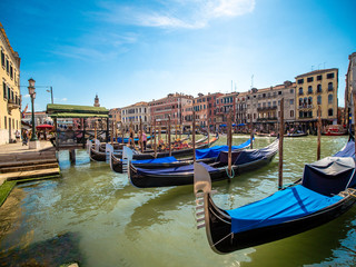 Fototapeta na wymiar Postcards of Venice navigating the river gondolas canals restaurants views