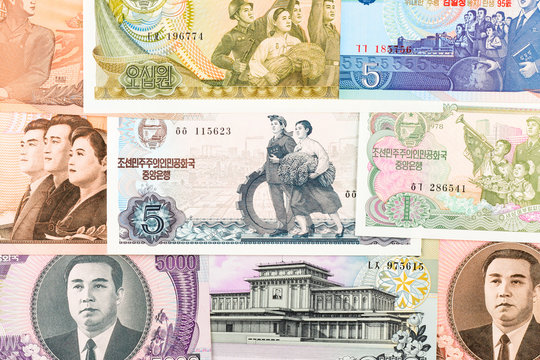 North Korea Won banknotes background. High resolution vintage photo of North Korean bill 3, DPRK money close up macro.