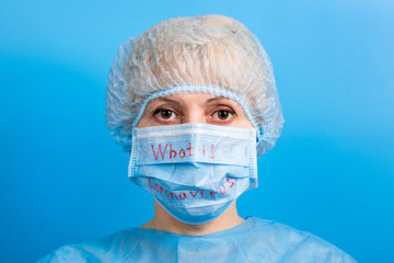 Portrait of ill woman wearing medical uniform and mask with what is coronavirus text at blue background. Coronavirus and health care concept