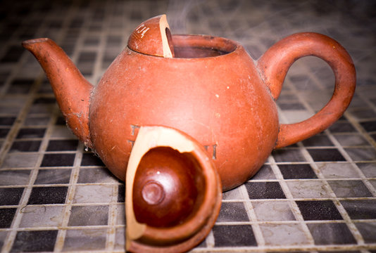 Close-Up Of Broken Teapot