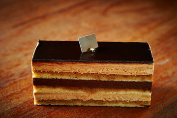 Chocolate cake on wooden background 