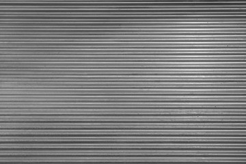 Obraz premium Metal texture pattern, ribbed cast iron surface, textured black background , wall for dark backdrop , loft style interior.