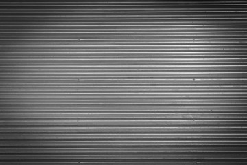 Obraz premium Metal texture pattern, ribbed cast iron surface, textured black background , wall for dark backdrop , loft style interior.