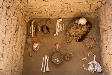 Mummies in the Chauchilla Cemetery in desert near Nazca and Ica in Peru.
