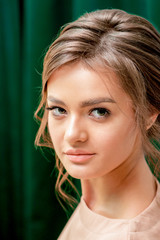 Fototapeta premium Face portrait of beautiful caucasian young woman with perfect skin and make-up, close up.