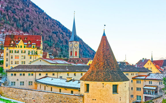 Tower and Church of St Martin in Chur in morning. Chur is the capital of canton Graubunden in Switzerland. It lies in the Alpine Grisonian Rhine valley. The city is the oldest town of Switzerland