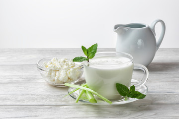 Airan or kefir drink, fermented milk drink, fermented probiotics on a white background - obrazy, fototapety, plakaty