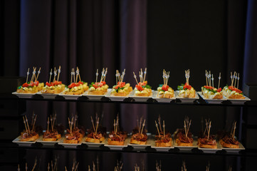 Wedding fourchette table decorated with sandwiches