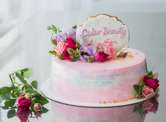 pink cake with flowers