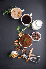 Obraz na płótnie Canvas Mushroom Chaga Coffee Superfood Trend-dry and fresh mushrooms and coffee beans on dark background with mint.