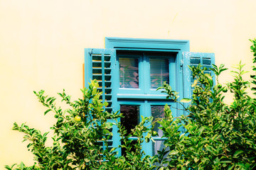 Fototapeta na wymiar Closeup of a facade of a house in the Plaka neighborhood in Athens