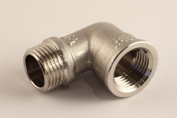New from 1/2" to G 1/2" thread pipe corner adaptor, close up plumbing equipment on white background