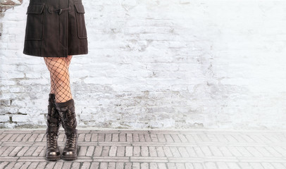 women's feet in rough boots