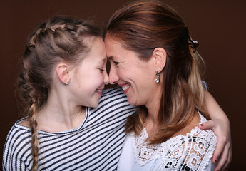 Happy mother and daughter