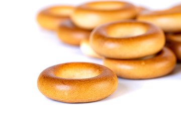 Small dry bagels, small rolls on a white background