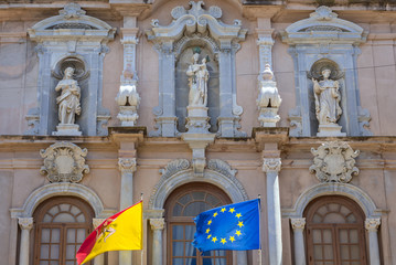 Fototapeta premium Details of facade of Cavarretta palace in Trapani, capital of Trapani Province on Sicily Island in Italy