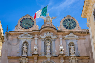Obraz premium Close up on facade of Cavarretta palace in Trapani, capital of Trapani Province on Sicily Island in Italy