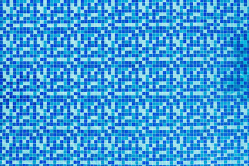 Swimming pool background, summer and vacation concept, detail of blue swimming pool