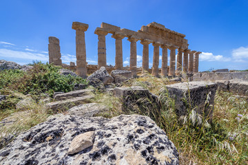 Fototapeta na wymiar Columns of Temple C dedicated to Apollo in Selinunte also called Selinus - ancient city on Sicily Island in Italy