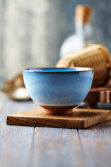 Traditional, handcrafted ceramic on stone background.