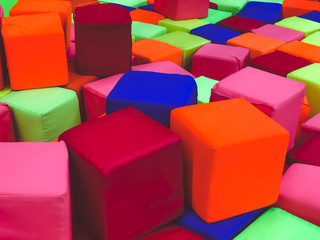 Obraz premium Soft cubes in the dry pool of the game children's room for kids.