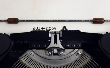 Old retro vintage typewriter with typed heading 2019-nCoV