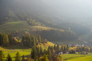 Typical scenery of Trentino Alto Adige South Tyrol in Italy in Dolomites Alps region during autumn...