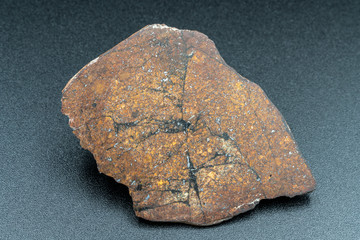 Inside slice of Chondrite Meteorite L Type isolated, piece of rock formed in outer space in the...