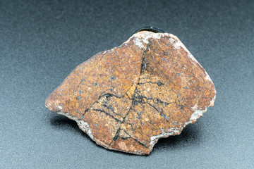 Inside slice of Chondrite Meteorite L Type isolated, piece of rock formed in outer space in the early stages of Solar System as asteroids. This meteorite comes from an asteroid fall at Atacama Desert © abriendomundo