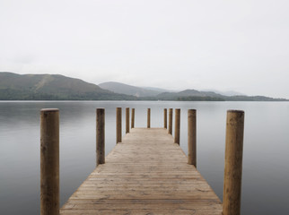 Obraz premium Derwent water this is the Ashness landing jetty where the tourist boats dock so you can get off and explore the surrounding hills of the lake district.