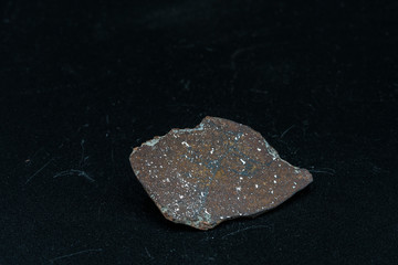 Inside slice of Chondrite Meteorite L Type isolated, piece of rock formed in outer space in the...