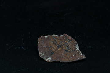 Inside slice of Chondrite Meteorite L Type isolated, piece of rock formed in outer space in the early stages of Solar System as asteroids. This meteorite comes from an asteroid fall at Atacama Desert  © abriendomundo