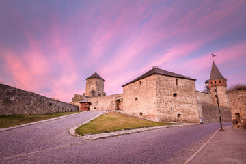 Fototapeta na wymiar Kamianets-Podilskyi Castle at sunrise