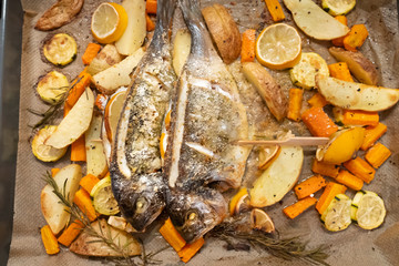 Perfectly cooked sea bream on oven-cooked vegetables