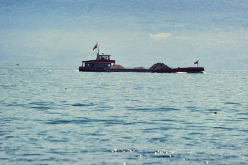 Dry cargo vessel on Lake Geneva in Lausanne, Switzerland