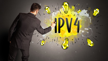 businessman drawing colorful light bulb with IPV4 abbreviation, new technology idea concept