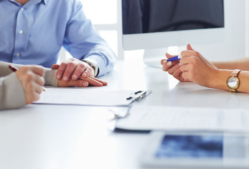 close up of patient and doctor prescribing medication