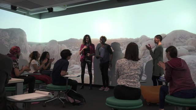 Students Presenting To Class In VR Classroom